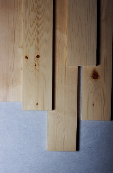 Several smooth finished white spruce (Picea glauca) and Englemann spruce (Picea engelmannii) dimensional lumber boards shown as examples