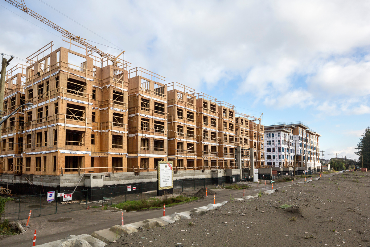 Exterior mid construction daytime view of five storey Alexandra Court in Richmond showing light frame construction