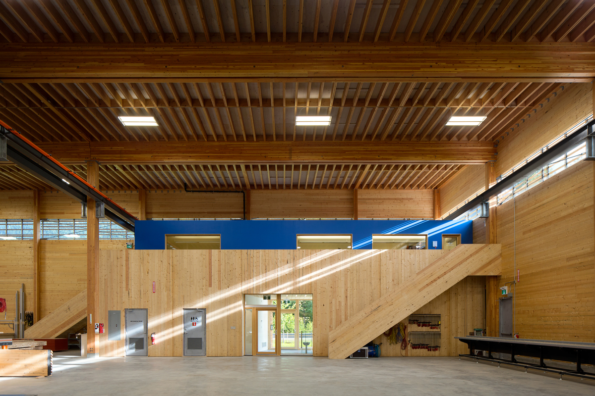 Interior daytime view of BC Passive House Factory showing hybrid & passive house construction featuring Cross-laminated timber (CLT), Glue-laminated timber (Glulam), and paneling