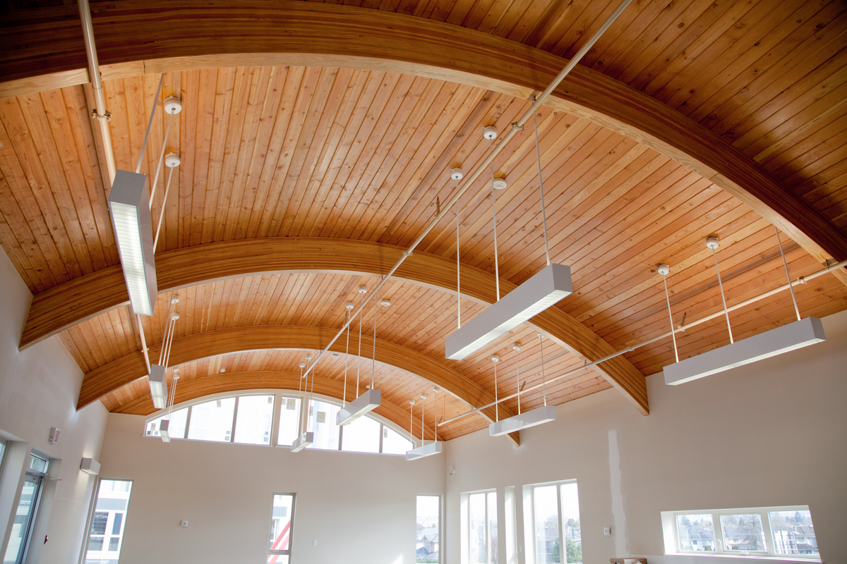 Wood detail curved ceiling in REMY Daycare