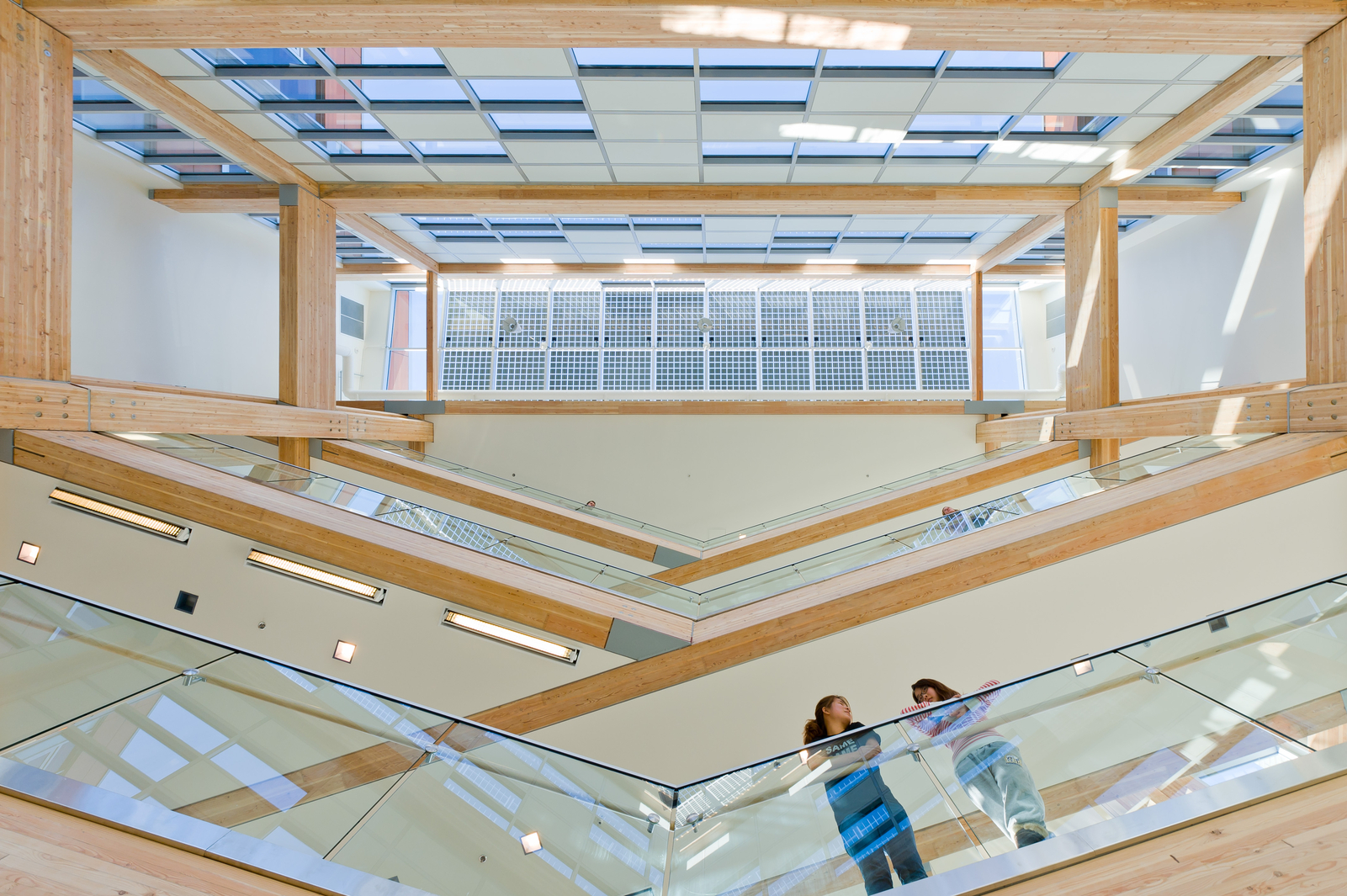 Glue-laminated timber (Glulam) and sustainable design are featured in this four story upward interior atrium view of the Centre for Interactive Research on Sustainability (CIRS)