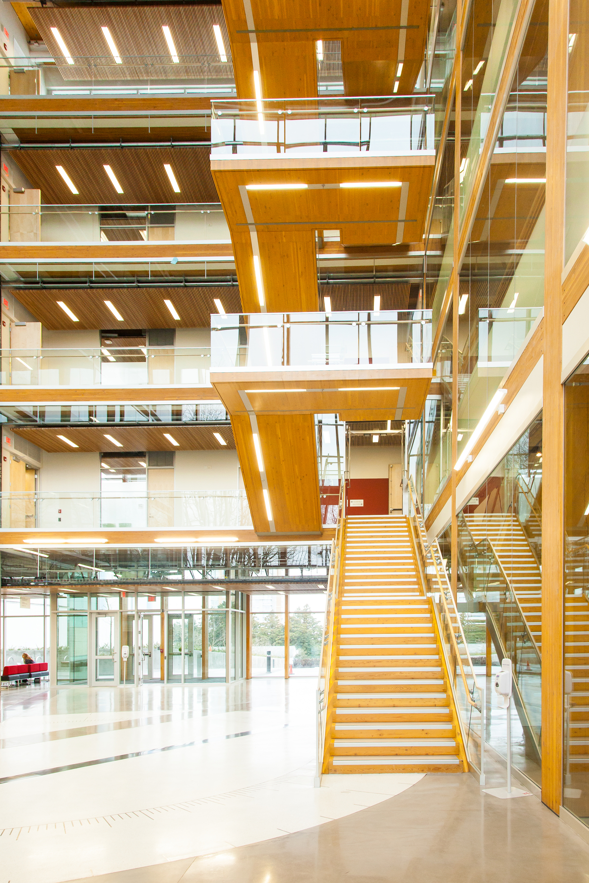 Internal view of UBC Earth Sciences Building atrium demonstrating multi-storey timber construction techniques for higher-density urban environments