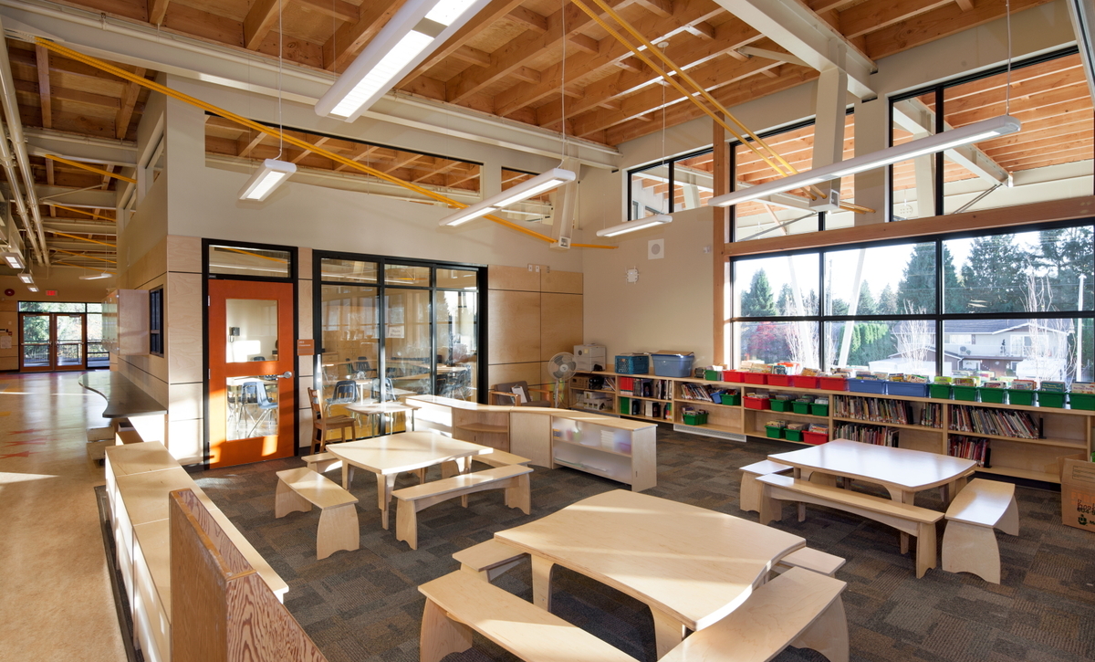 Interior daytime view of low rise James Park Elementary School showing exposed wood ceiling construction, which provides warmth and beauty to this 370-student Port Coquitlam elementary school
