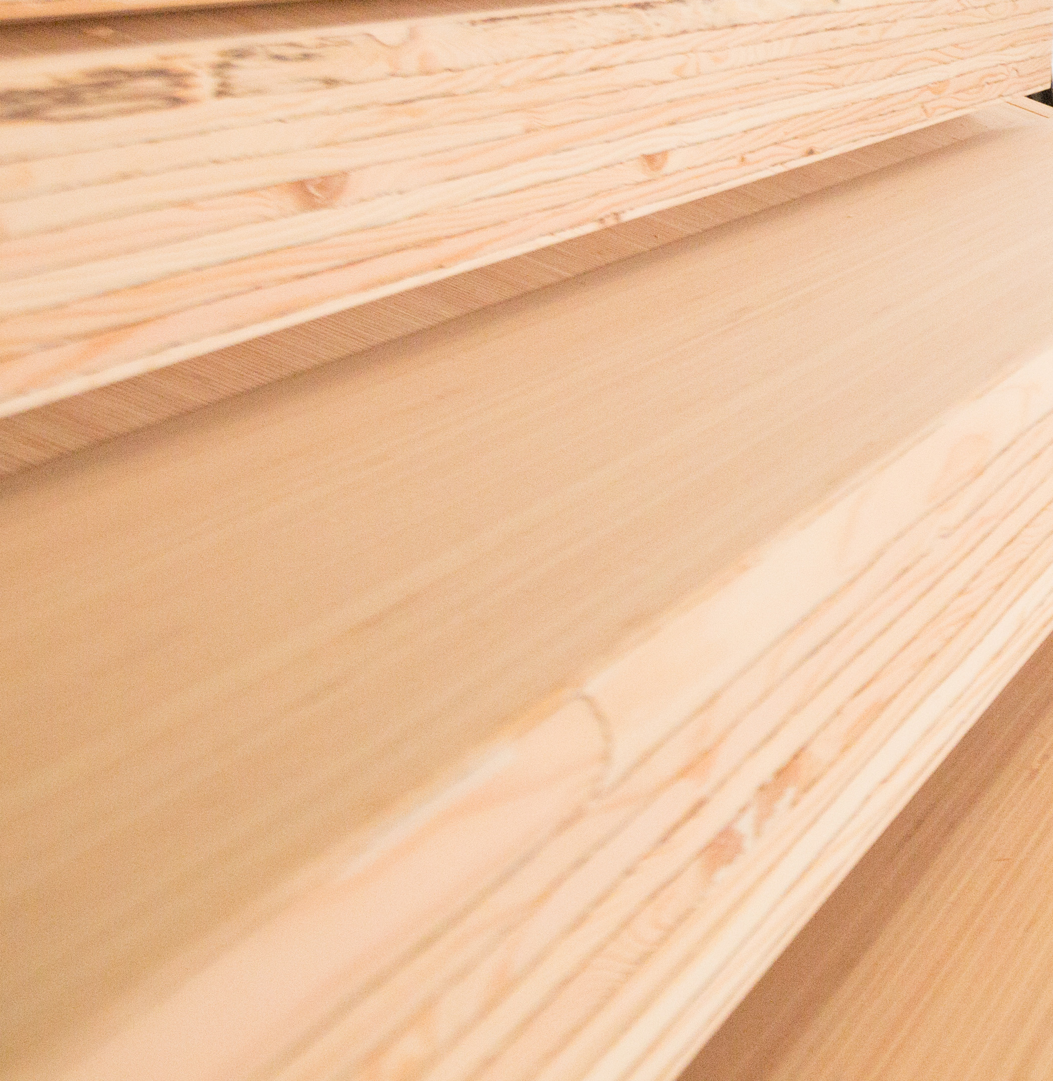 Close up view of Laminated veneer lumber (LVL), one of several different mass timber products made in BC, while being manufactured
