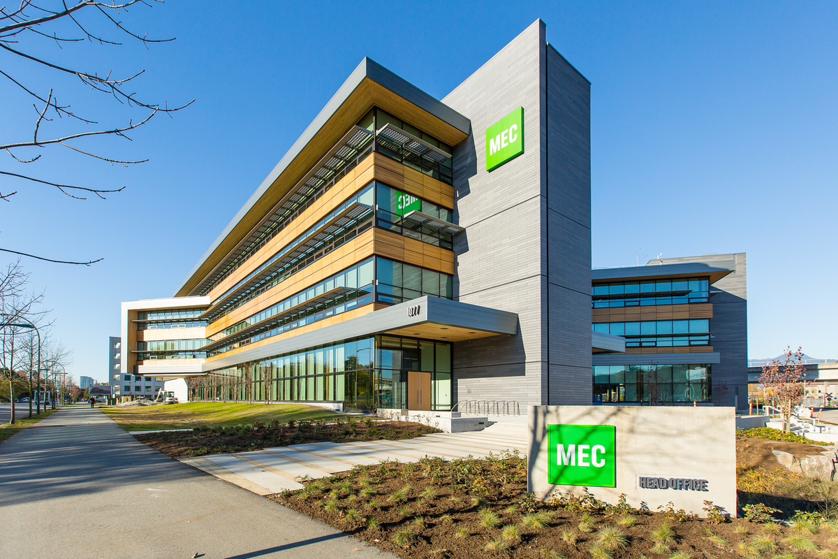 Exterior view of completed MEC Headquarters building which features mass timber construction, prefabrication, hybrid wood, and tall wood design
