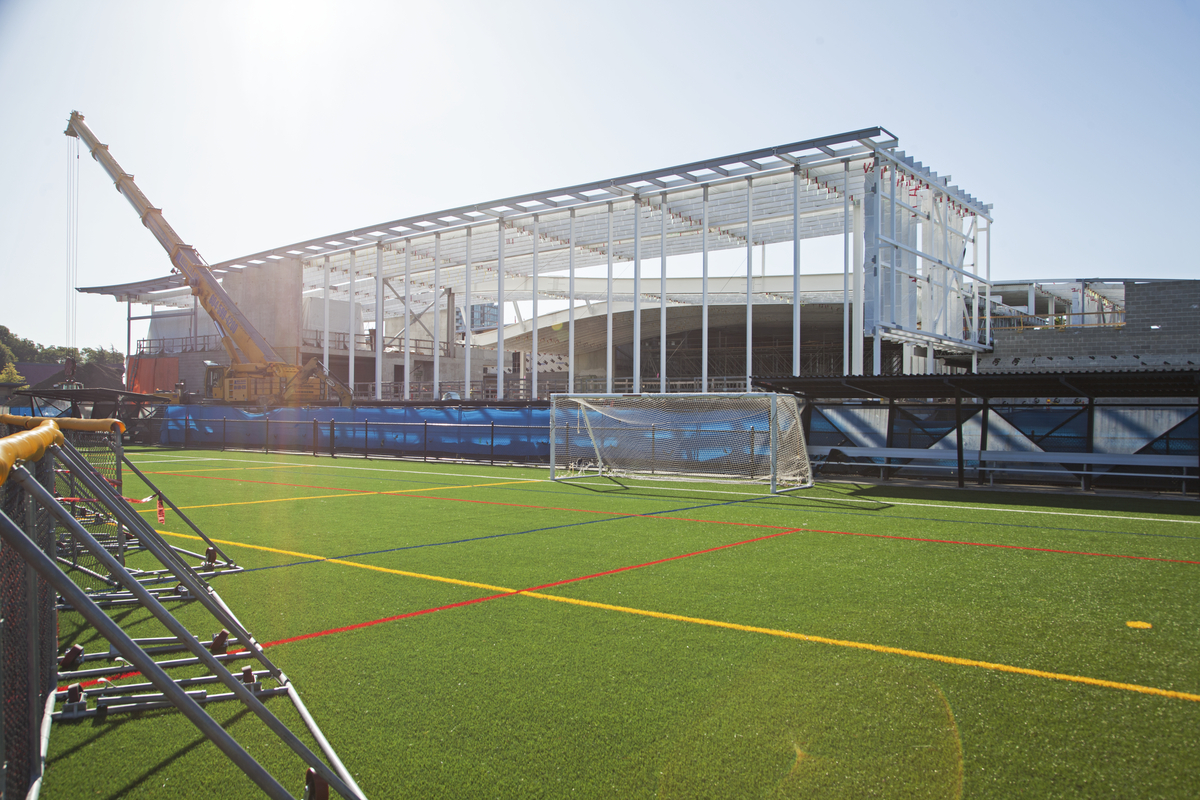 Exterior daytime view of Minoru Centre for Active Living athletic field during construction of primary building