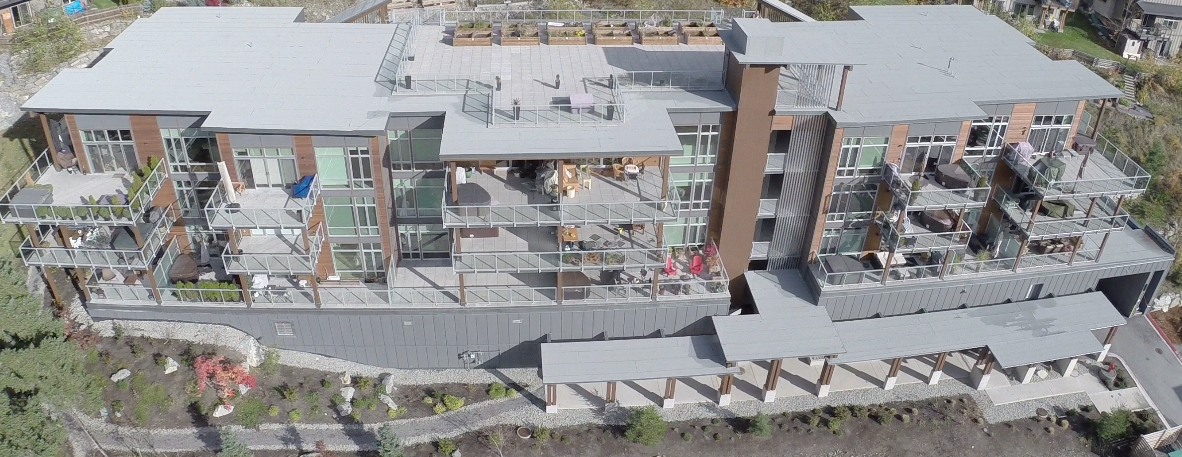 Daytime aerial drone view of Solana, a multi-family hybrid residential project, built with mass timber and light frame construction, including I-beams/I-joists and Laminated veneer lumber (LVL)