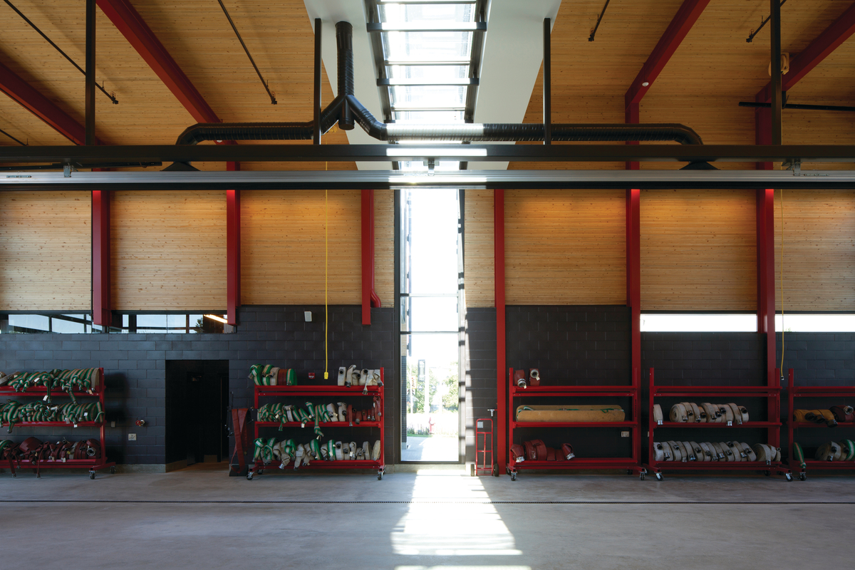 Nail laminated timber (NLT) solid-wood decking, used for the roof and wall panels, is shown in this interior vehicle bay image of the Steveston Fire Hall No. 2