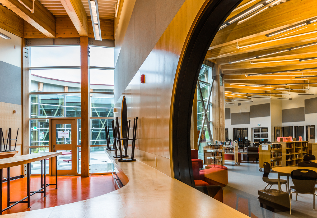 Glue-laminated timber (Glulam), Laminated veneer lumber (LVL), and Plywood prominently featured in this interior view of Wellington Secondary School