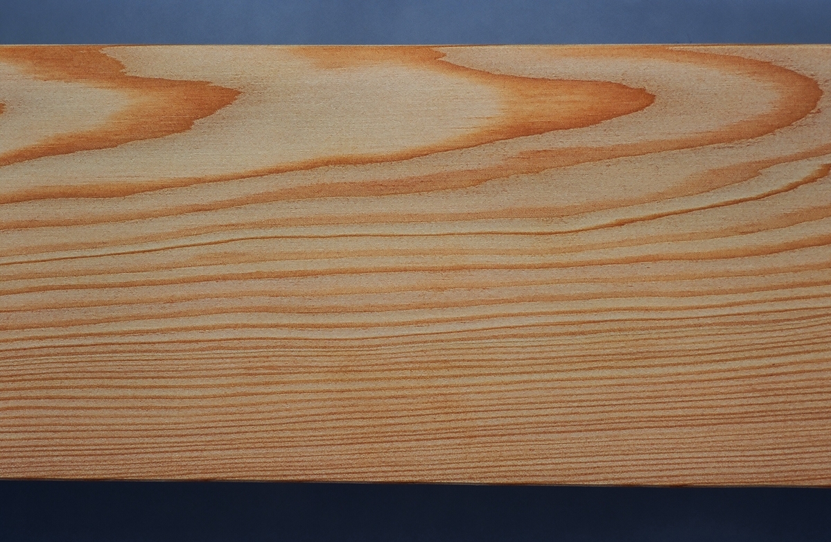 Close up to wood grain contour patterns.