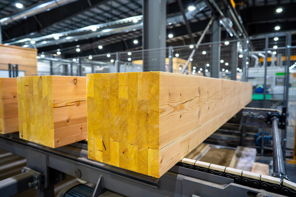 Close up of glue-laminated timber in a factory.