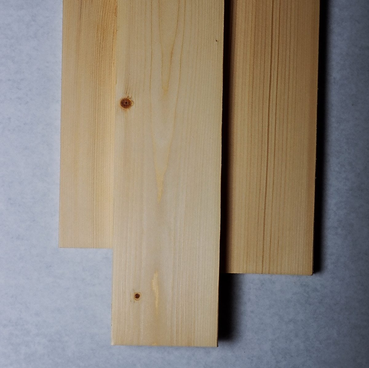 Several smooth finished Subalpine Fir (Abies lasiocarpa) dimensional lumber boards shown as examples